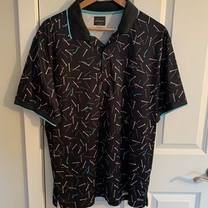 Black Greg Norman Golf Polo with Tees Design